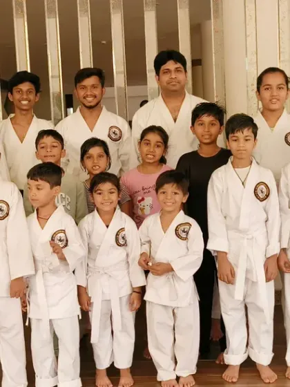 A mixed group of students from our Virar dojo, from white belts to black belts. This photo represents the supportive, family-like atmosphere where everyone trains and grows together.