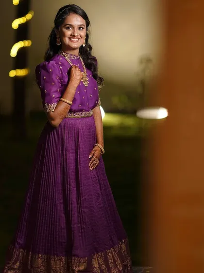 Another beautiful shot of our client in the purple gown, perfect for an evening celebration.
