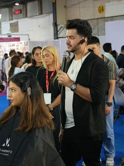 On the Colour Pod stage at Professional Beauty India, bringing my unique vision for imaginative color work to life in front of a live audience.