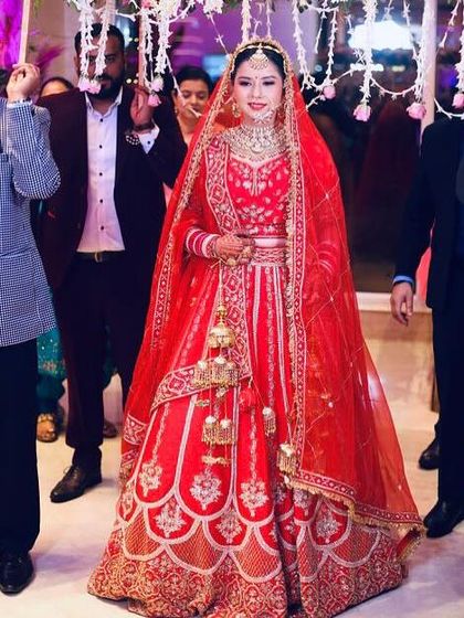 My bride Heena making her entrance. She looks so happy and confident, ready to walk down the aisle.