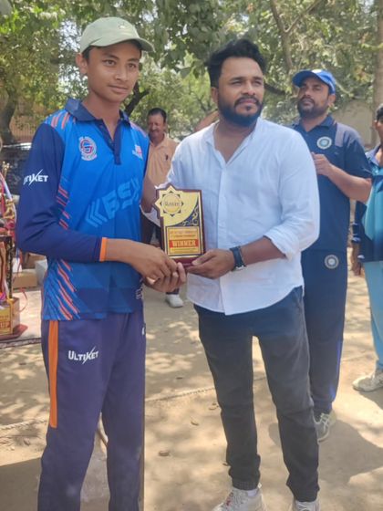 Celebrating another individual award. My coaching philosophy focuses on both team success and individual player development.