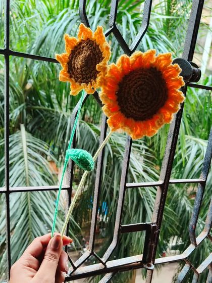 Here are two of my crochet sunflowers, ready to be bundled into a bouquet. The detail in each petal is something I work hard on to make them look just right.