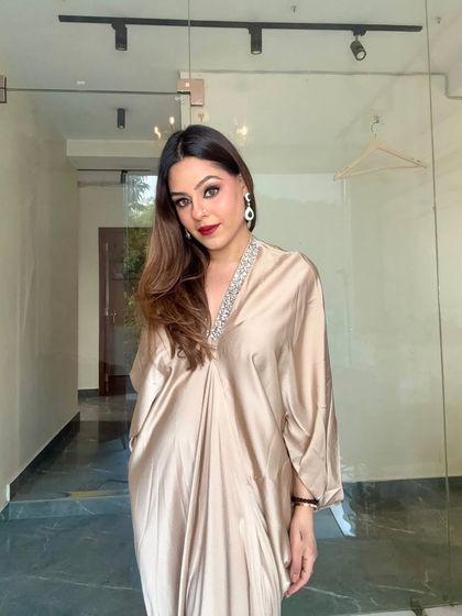 A full-length shot showing my personal style. I love outfits that are as glamorous as the makeup.