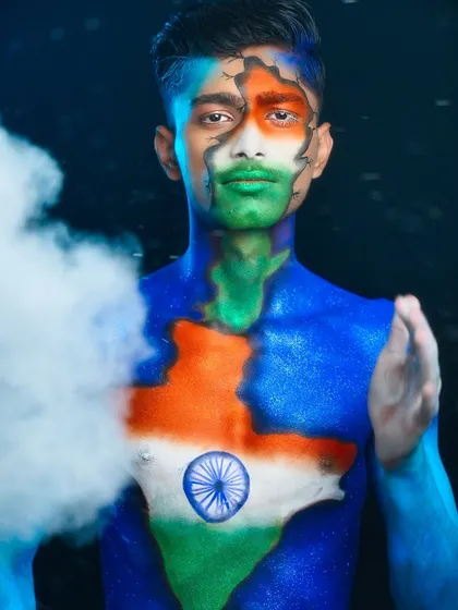 An artistic shot using smoke to add drama to the patriotic makeup look.