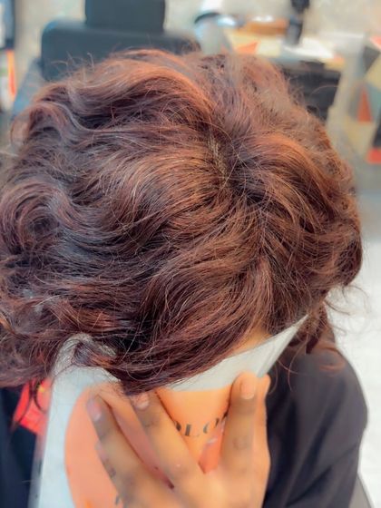 I also offer pre-cut styles, like this female bob cut wig. This piece features a rich brown color with subtle highlights and a very natural-looking scalp parting.