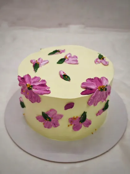 A cake with a beautiful palette-knife painted floral design, made by a student in my advance cream cakes workshop.