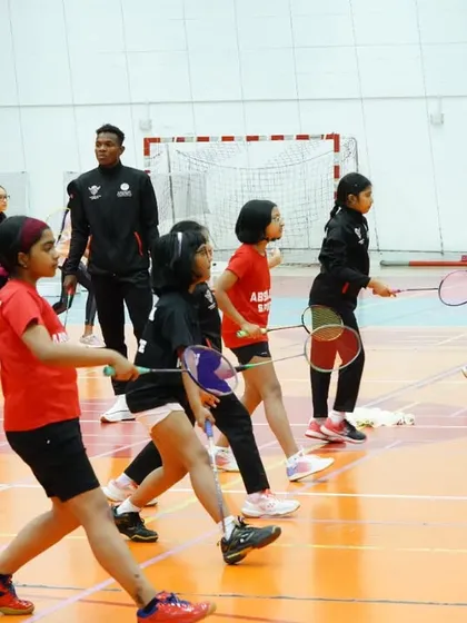 Young players in Qatar participating in a footwork drill during a training session at our Absolute Sports center.