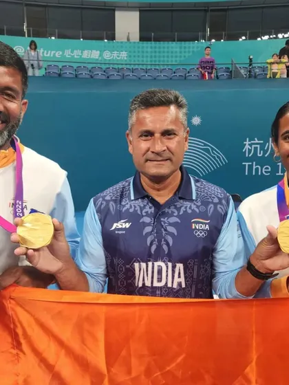 A golden moment for India. I am pictured with the mixed doubles gold medalists Rohan Bopanna and Rutuja Bhosale at the Asian Games, a testament to their incredible performance.