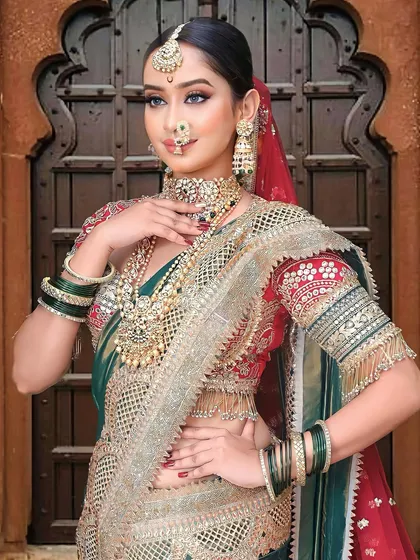 A full view of the royal Maharashtrian nauvari look we created for the Beauty Expo. The rich green and red combination paired with heavy jewelry creates a truly regal effect.