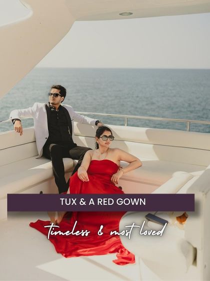 The timeless combination of a tuxedo and a red gown is the epitome of glamour. This look is perfect for a luxury setting like a yacht, creating an atmosphere of sophistication and classic romance.
