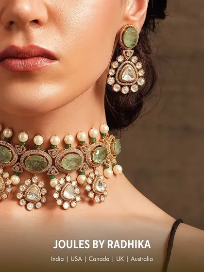 A close-up of the exquisite emerald and polki choker set, as seen on Hansika Motwani, perfect for a bride or for a grand festive occasion.
