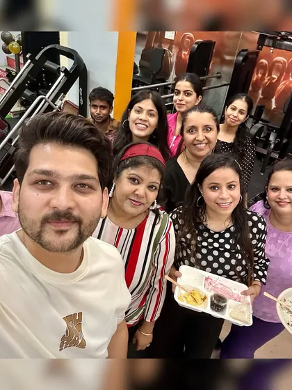 Enjoying some post-party snacks with the gym family. It's all about balance and enjoying life.