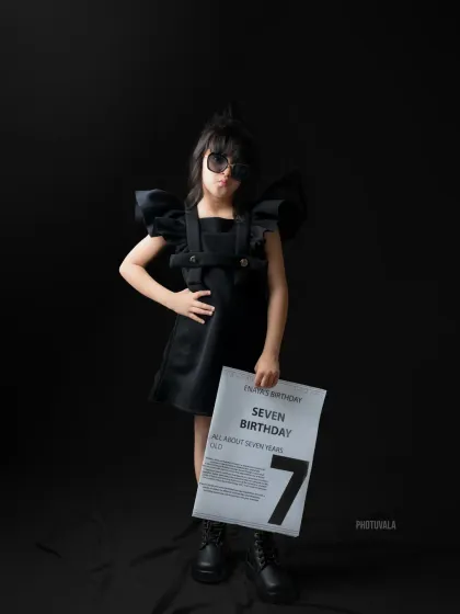 Turning seven in style! We love creating modern, edgy birthday shoots for older kids too. This 'Level 7 Unlocked' theme with a custom newspaper prop shows off her cool personality.