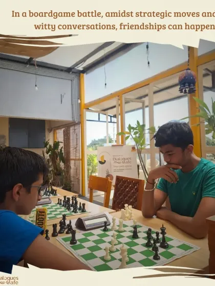 A board game battle can be the start of a new friendship. Here, two players are deep in a game of chess, surrounded by the greenery of our rooftop terrace.