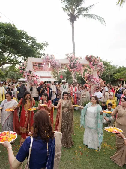 The full view of a choreographed groom's welcome, showing how we involve the entire family to create a large-scale, heartfelt moment.