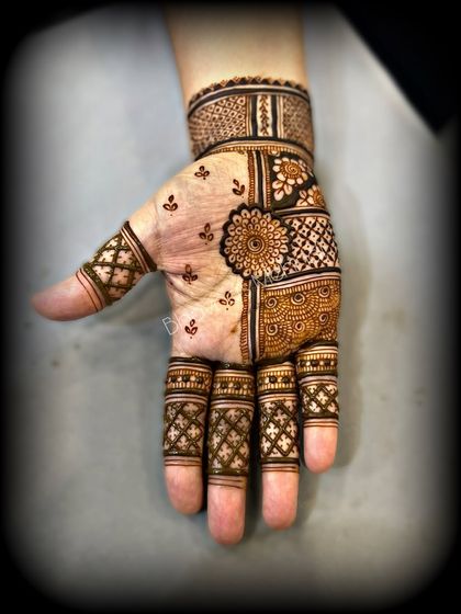 A creative patchwork design combining different traditional patterns like checks and florals. This is a fun and unique style we teach.