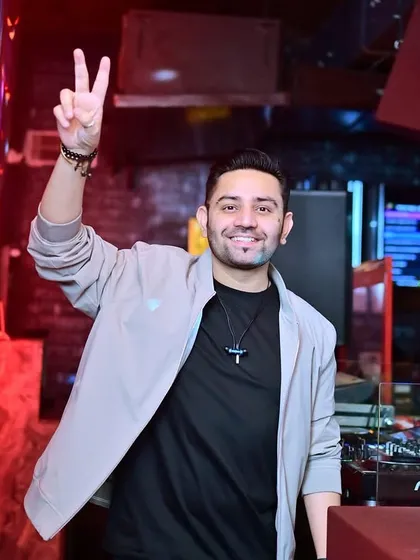 Peace sign from the DJ booth at Tipsy Bull.