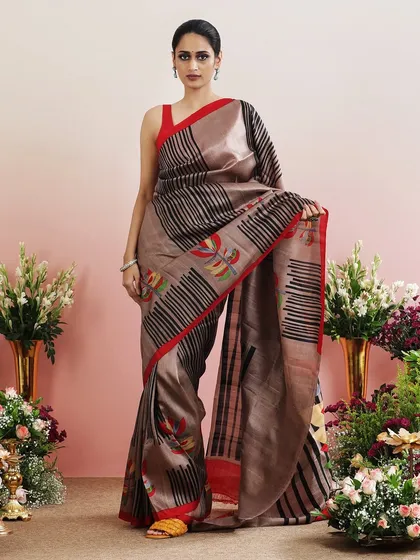 The full, standing view of the abstract printed saree, a true work of wearable art.