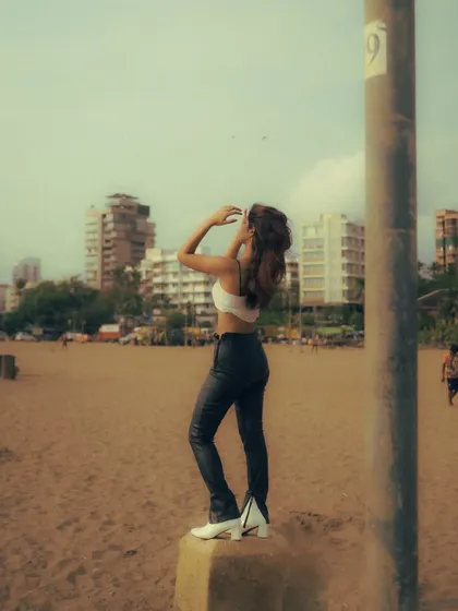 An editorial-style beach shoot with an edgy, high-fashion look. The mix of color and black and white images shows the versatility of a single location.