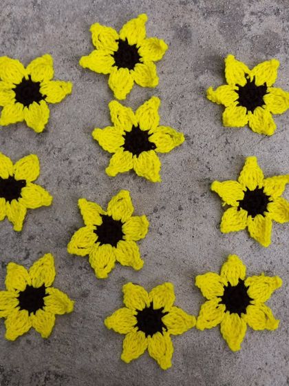 A collection of sunflower appliques. These can be used in various DIY projects or turned into keychains, magnets, and more.