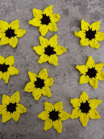 A flat lay of the sunflower appliques, ready to be used in various projects.