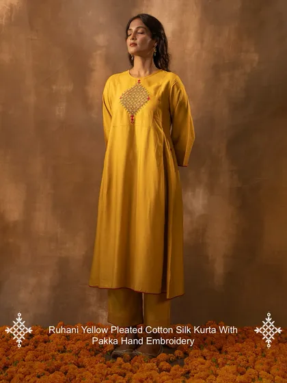 This is our Ruhani Yellow Pleated Kurta, a piece that embodies the spirit of our craft. Made from a soft cotton-silk blend and adorned with intricate Pakka hand embroidery, it’s designed to move with you, bringing a touch of festive light to your everyday moments.