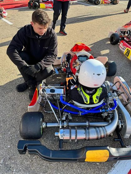 A driver and coach in the pit lane in Zuera, Spain.
