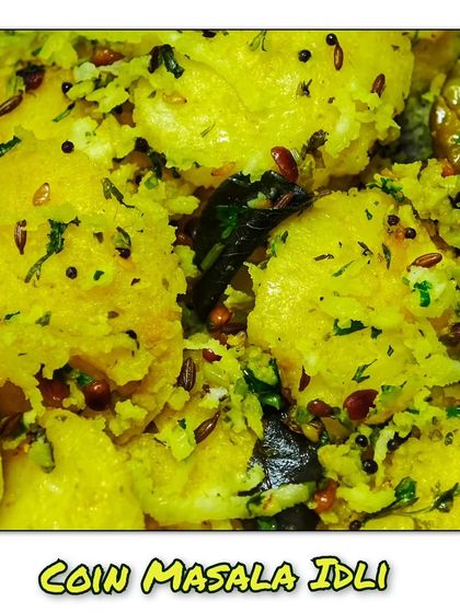 A plate of chatpata Coin Masala Idli, a savory and tangy snack that's both light and flavorful.