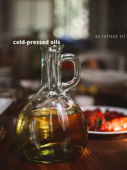 A clear view of the cold-pressed oil we use in our kitchen. It's a simple swap that makes a big difference in the nutritional quality of our food.