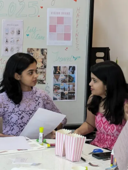 Two participants collaborating and sharing their dreams. Our workshops are designed to foster connection and create a space for honest conversations.