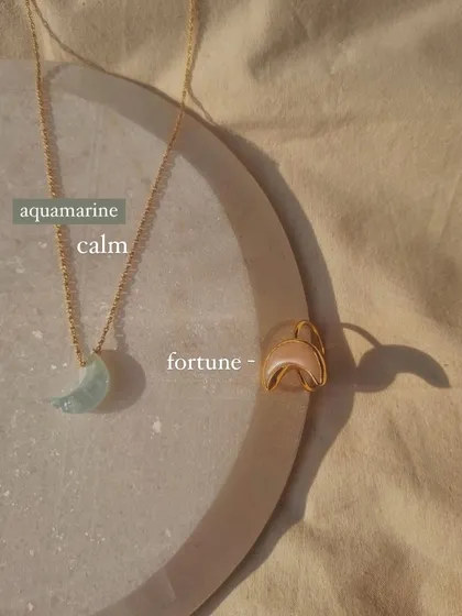 My 'aūra' aquamarine Luna pendant, a stone of soothing and calm. Its gentle blue-green color reminds me of the sea, bringing courage and enlightenment.