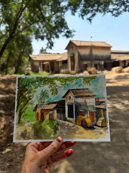 A peaceful watercolour painting of an old, rustic house in Mumbai's Aarey Forest. This sketch captures the quiet, natural side of the city, away from the urban hustle.