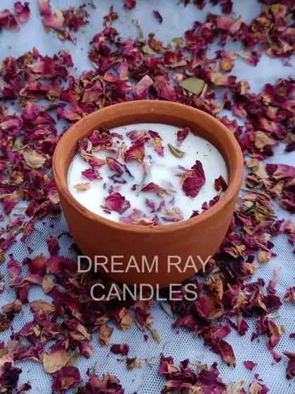 A final look at the rose premium scented candle. The terracotta pot is reusable, and the candle itself is designed to provide a long-lasting, peaceful rose fragrance for your space.