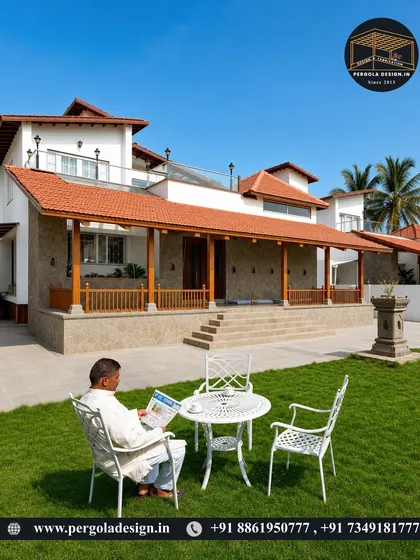 A grand traditional-style home with an expansive lawn. The tiled roof veranda provides a classic, shaded space for the owner to relax and enjoy the view of their property.