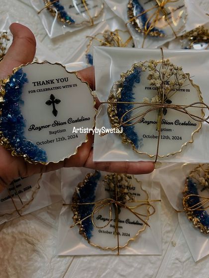 A new design for a luxury baptism favor. This epoxy magnet features a blue crystal geode edge and personalized details for baby Raynor.