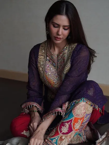 Draped in heritage, glowing with grace. Sonam Bajwa in a magnificent multi-colored embroidered suit from Rimple and Harpreet, a look that tells a story of rich Punjabi culture.