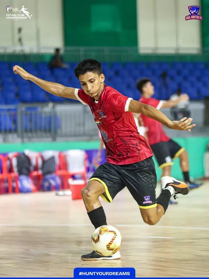 A player practicing his shooting before the third group match.