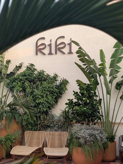 A sneak peek of the green photo-op corner we designed for Kiki in Pune. The combination of large banana leaves, terracotta pots, and comfortable seating makes it the perfect spot for guests.