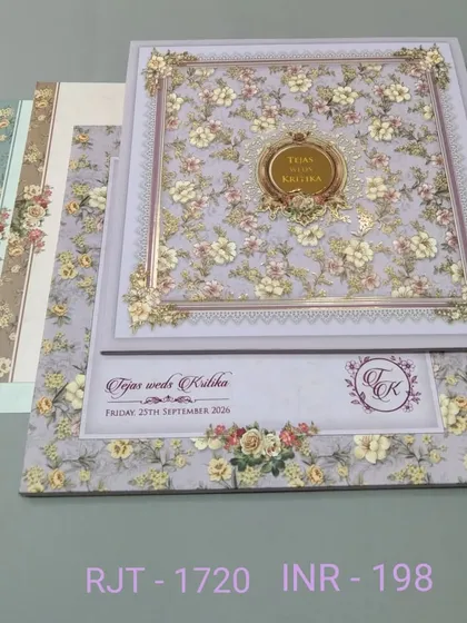 A lovely invitation with a dense floral pattern in pastel purple and yellow. The design is cheerful and romantic, perfect for a spring wedding.