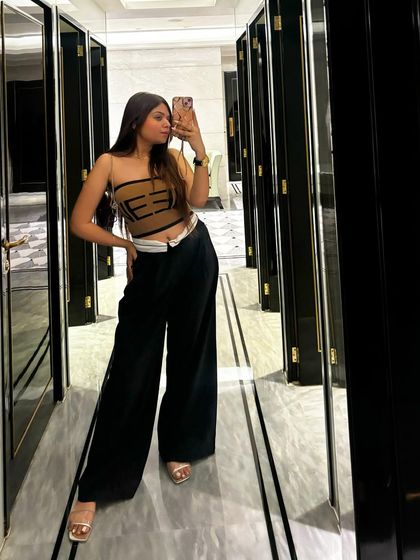 A final shot of the chic and modern outfit.