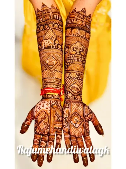 This design is for the bride who loves a grand, heritage look. I have included majestic elephants and the architecture of royal palaces, creating a story of tradition and grandeur right on her arms.