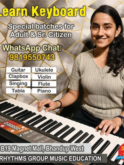 A smiling student at her keyboard lesson. We offer special batches for adults and senior citizens, creating a comfortable and encouraging atmosphere for learning instruments like the keyboard, piano, and violin.