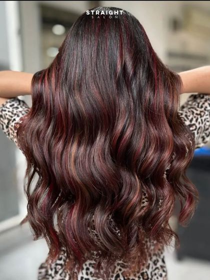 A full back view of the red balayage, showing the stunning color and shine.