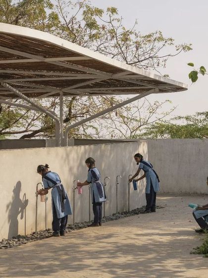 A lovely moment at the rural school, where students use new water taps outside the cafeteria. We focused on creating functional and dignified spaces for all aspects of school life.