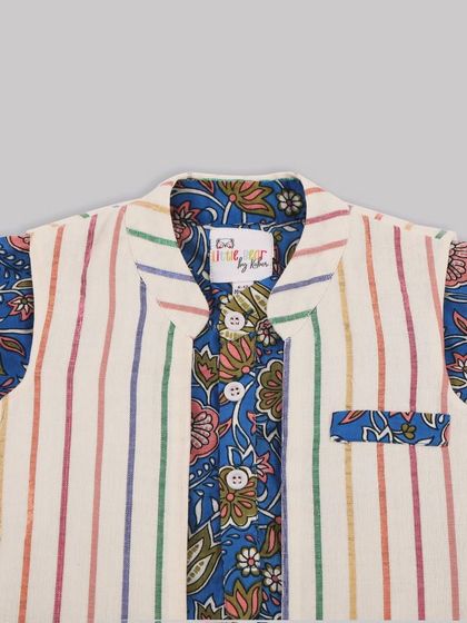 It’s all in the details. This image shows the beautiful layering of a Kalamkari print kurta with a multi-color striped bandi jacket, showcasing the quality and craftsmanship.