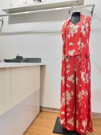 Co-ord sets are my specialty, and this red floral satin set is a perfect example of a bold, versatile outfit. Displayed here in my studio, it can be dressed up or down for any occasion.