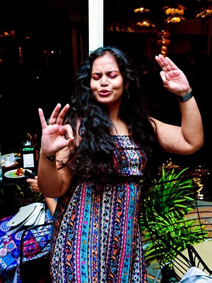 A great action shot of someone dancing and feeling the vibe of the music.