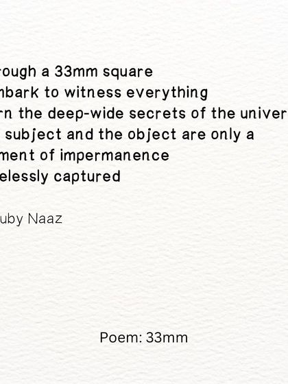 A poem inspired by a photographer, about witnessing the secrets of the universe through a 33mm square lens.