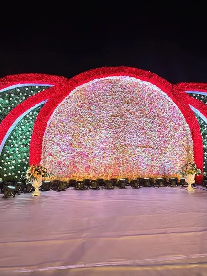 A straight-on shot of the magnificent floral reception stage, ready for the evening's festivities.