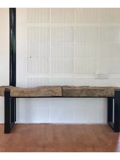 This bench was created for a private farmhouse project, designed with sustainability in mind. I used locally sourced wood for the raw, organic seat and paired it with a minimal black metal frame, focusing on creating beautiful furniture with minimal wastage.